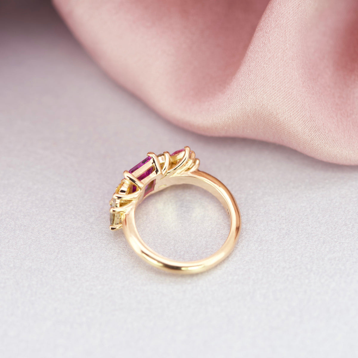 14k ring design with a cluster of sapphires