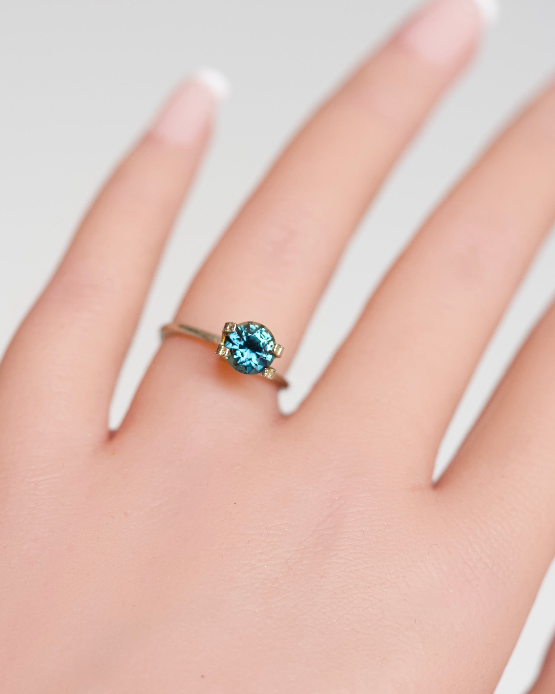1.59 ct Teal Blue Round Cut Heated Madagascar Sapphire