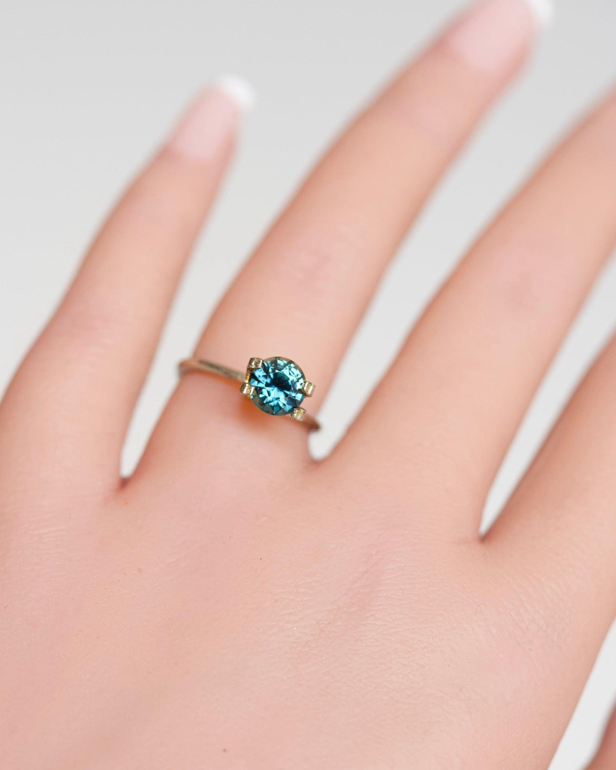 1.59 ct Teal Blue Round Cut Heated Madagascar Sapphire