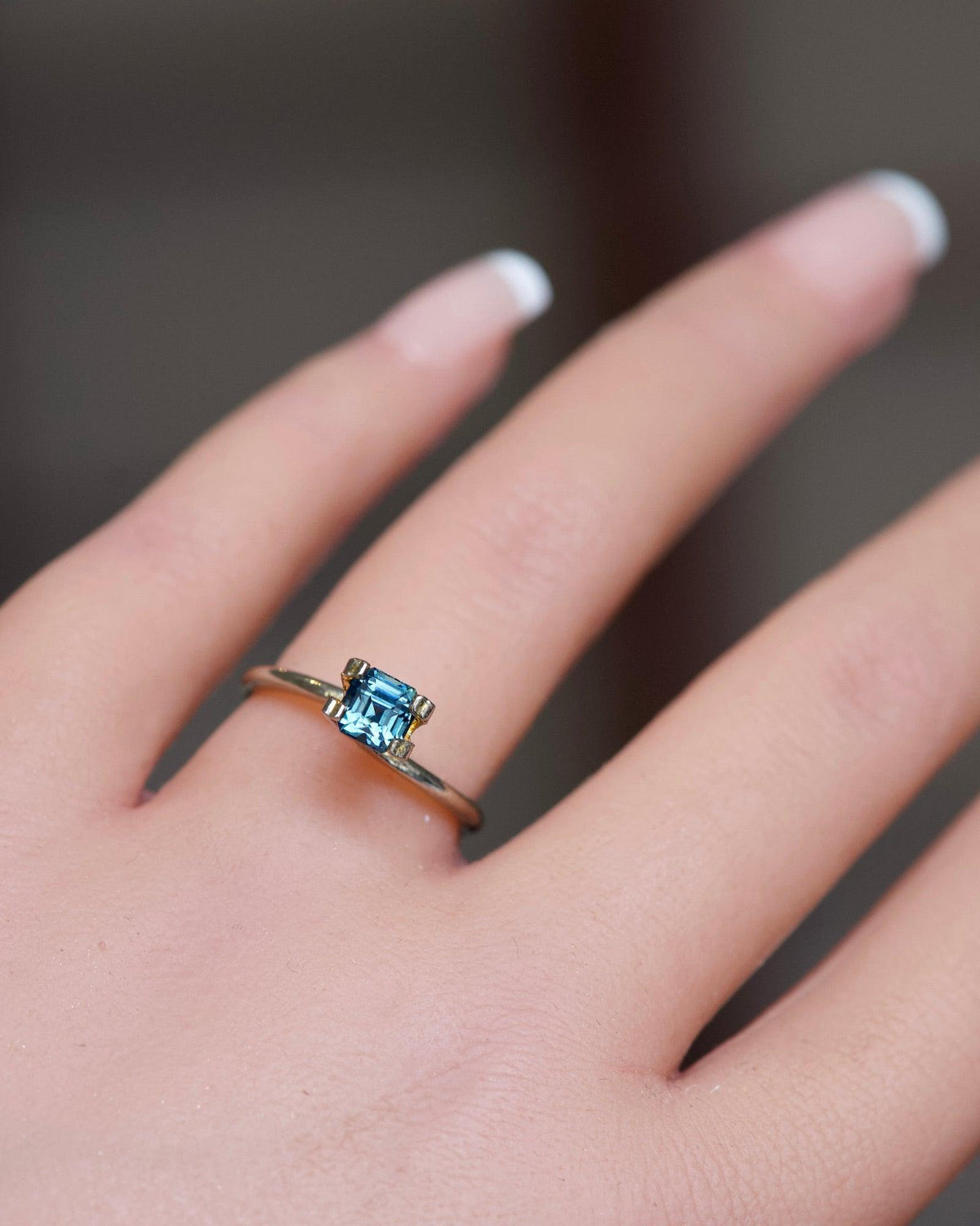 bluish green square cut sapphire gemstone