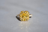 Yellow sapphire halo ring in sunlight