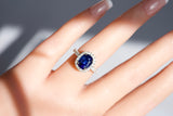 Blue Ceylon sapphire halo ring in natural light