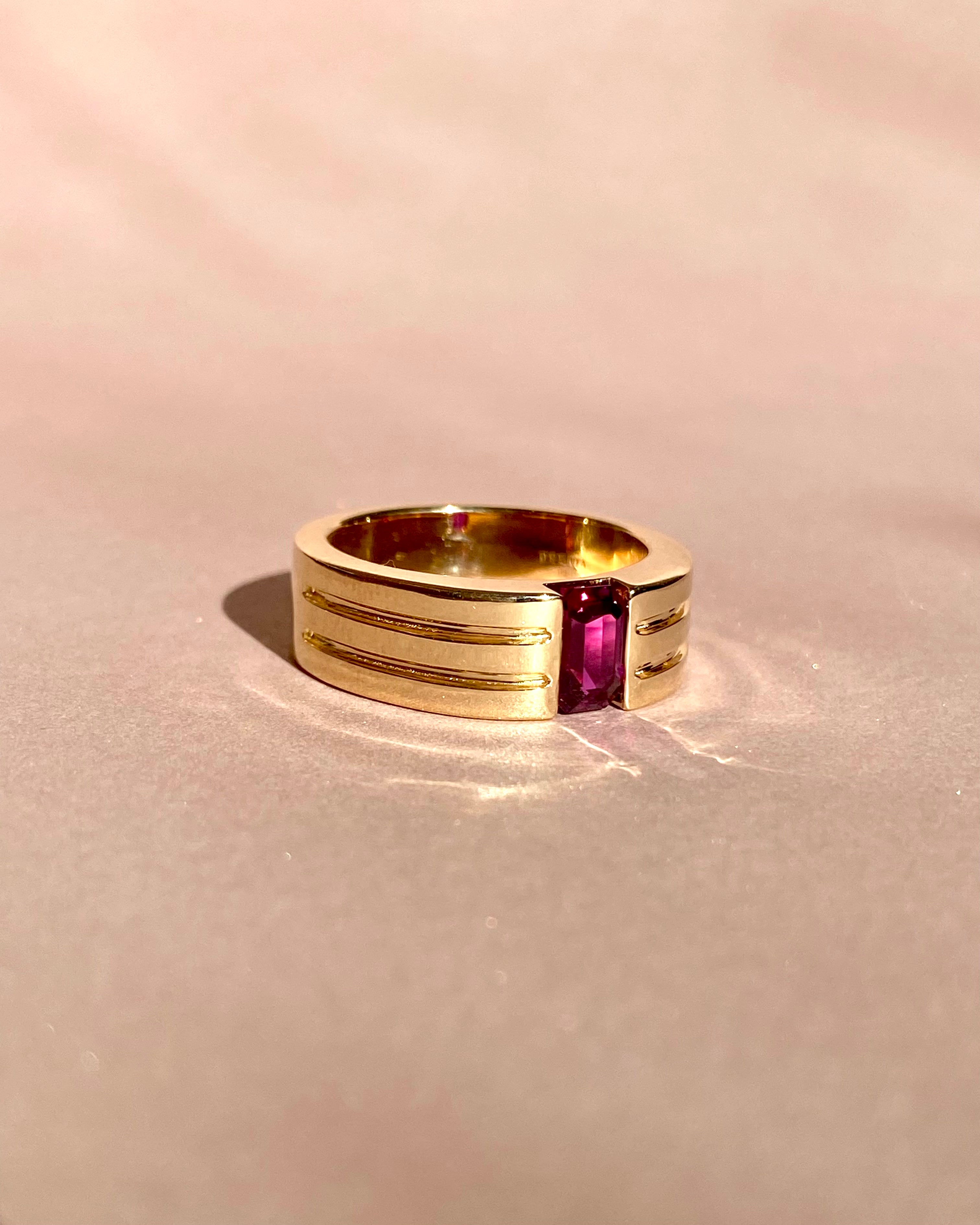 Ruby gold men’s ring in natural light