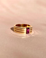 Ruby gold men’s ring in natural light