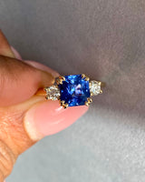 Blue sapphire diamond engagement ring in yellow gold