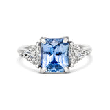 Radiant cut Ceylon sapphire and diamond three-stone ring