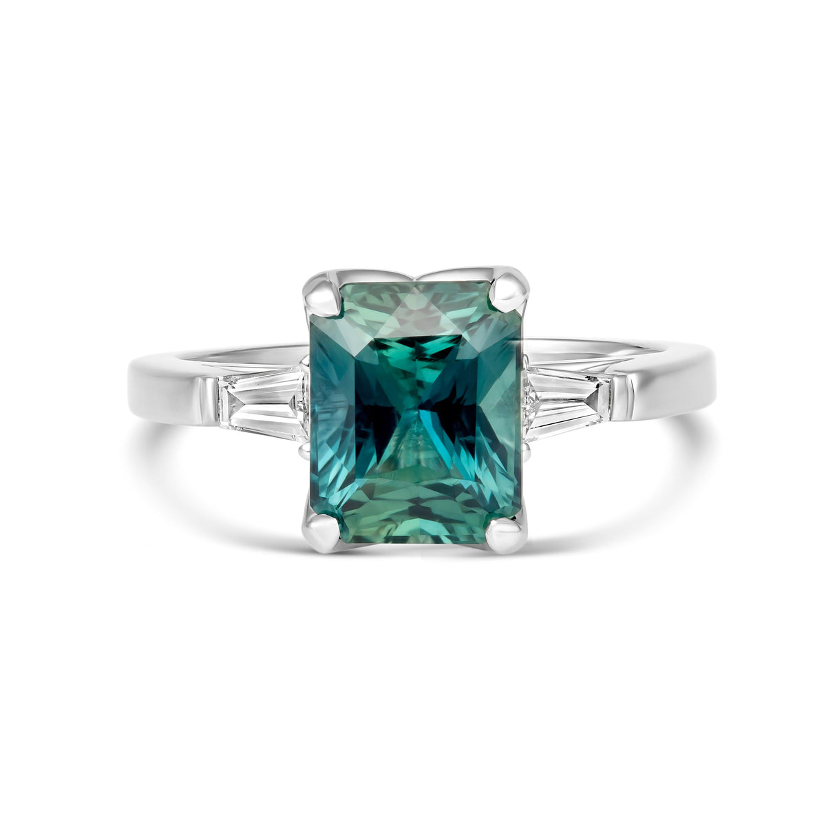 Emerald cut teal sapphire baguette diamond engagement ring