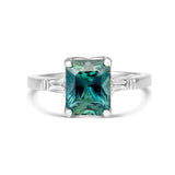 Emerald cut teal sapphire baguette diamond engagement ring