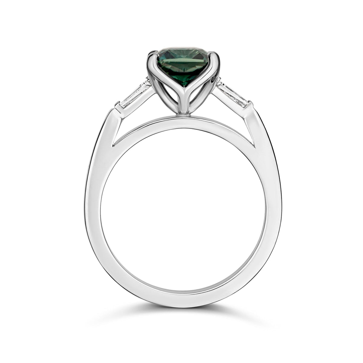 Teal sapphire and diamond three-stone ring in platinum
