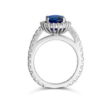 Cushion cut blue sapphire halo ring in platinum