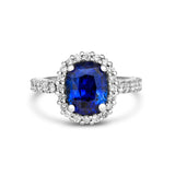 Royal blue Ceylon sapphire diamond halo engagement ring