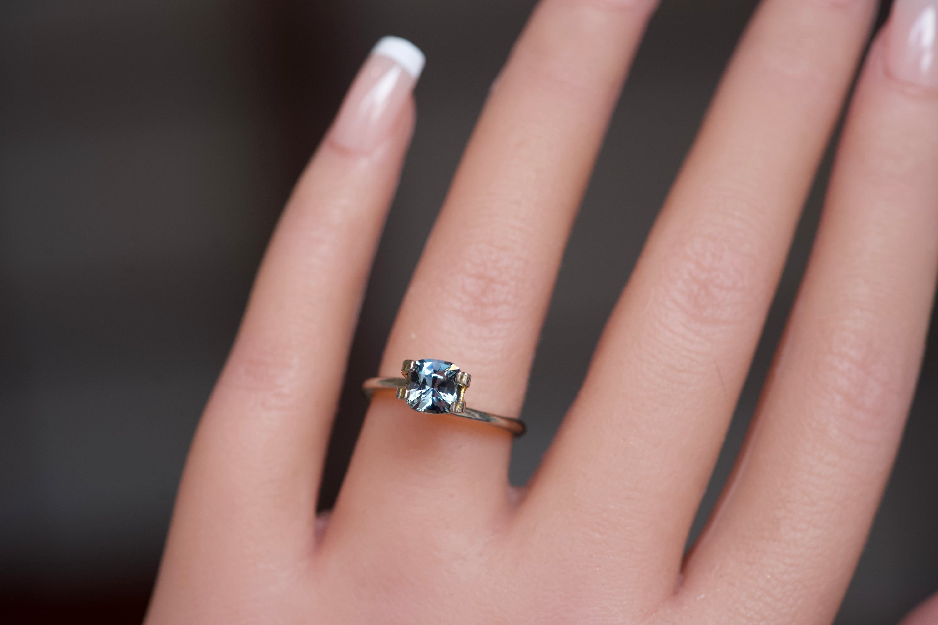 cushion cut bluish green gemstone