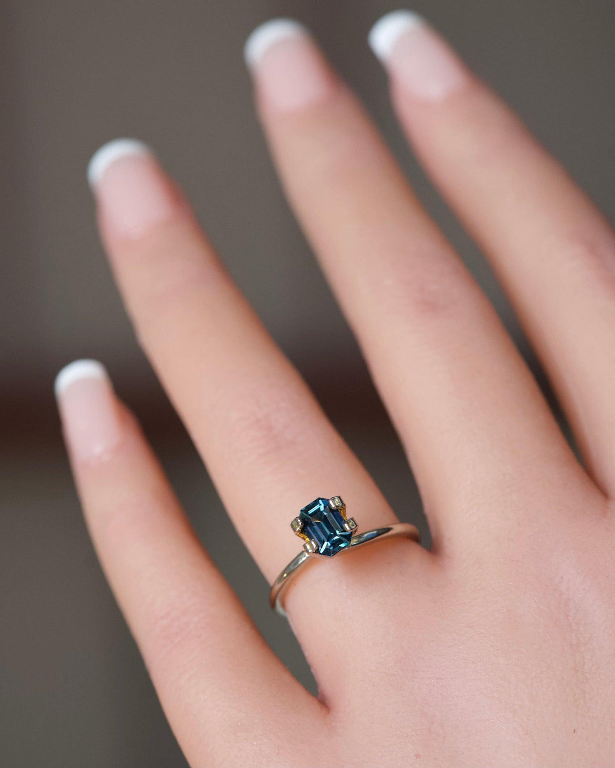 teal heated sapphire in emerald cut