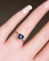 Bluish Green sapphire in Emerald Cut