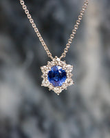 Ceylon blue sapphire diamond halo pendant, close-up