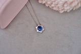 Blue sapphire snowflake pendant with diamonds on chain