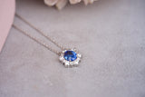 Ceylon sapphire diamond halo pendant on white gold chain