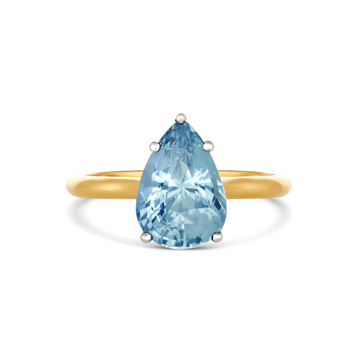 custom blue ceylon pear sapphire ring in white and yellow gold