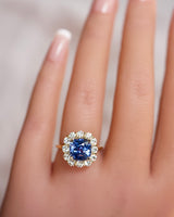 diamonds and cushion blue sapphire halo engagement ring