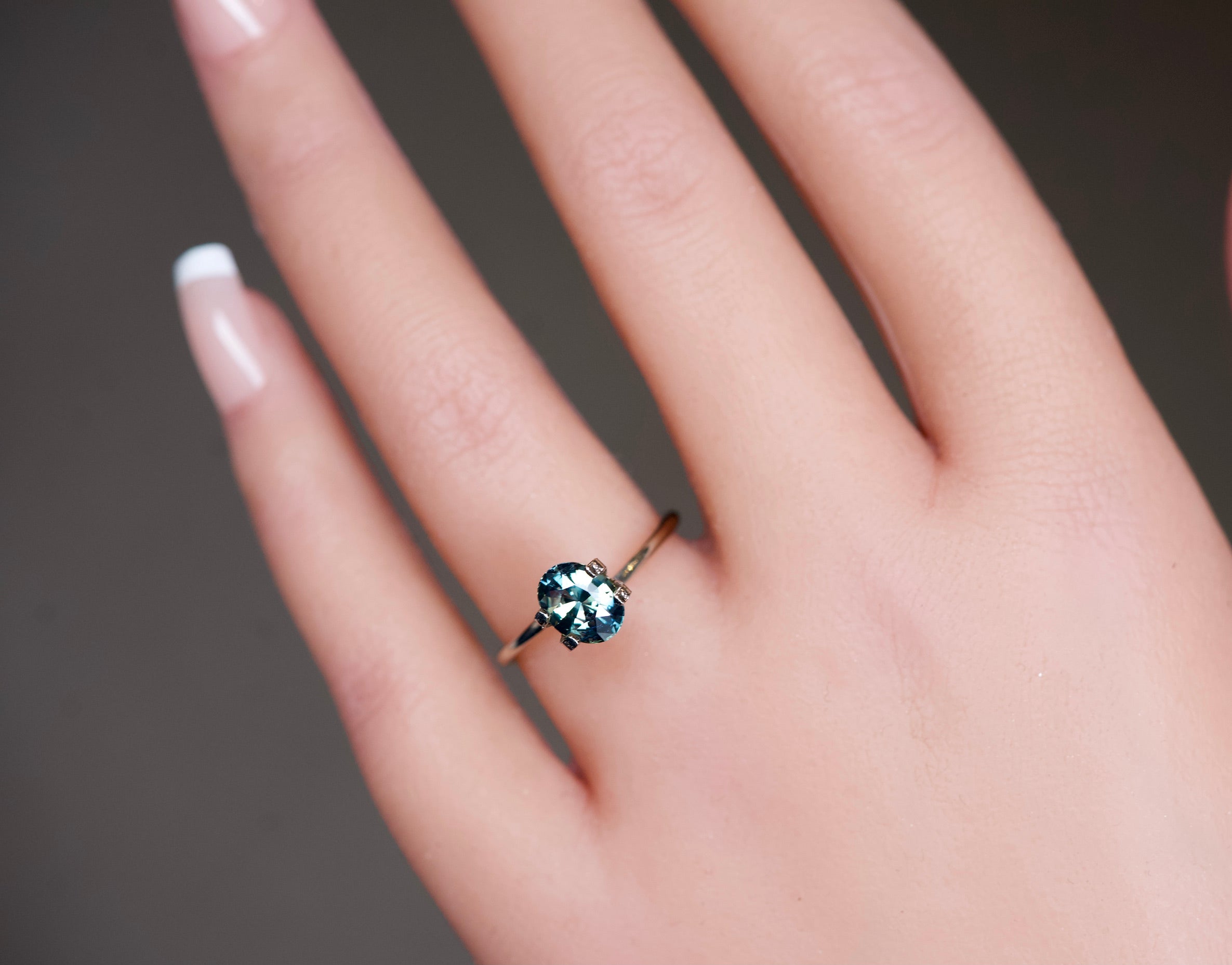 1.64 ct unheated bluish green sapphire gemstone