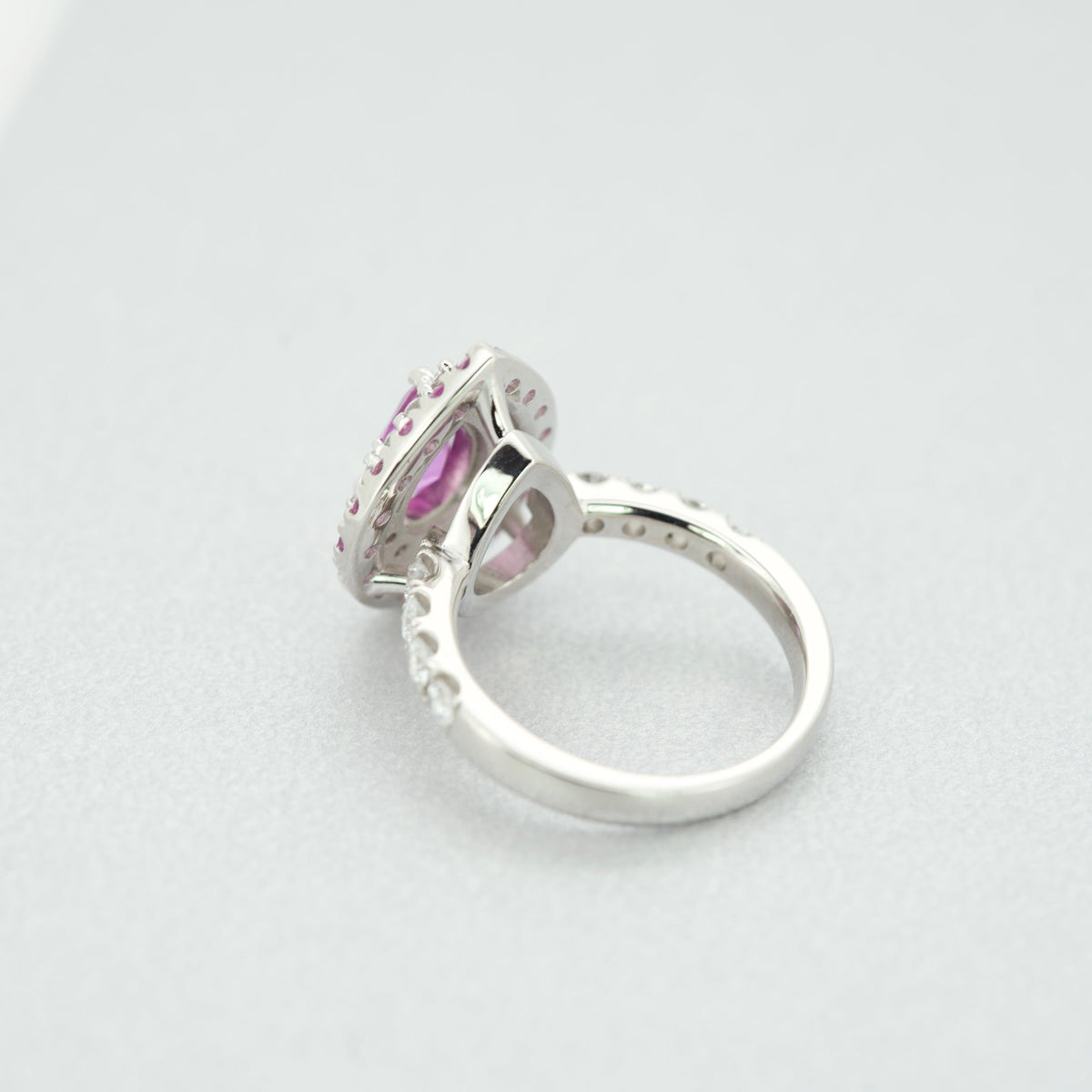The underside and basket detail of a handcrafted platinum pink sapphire right-hand ring
