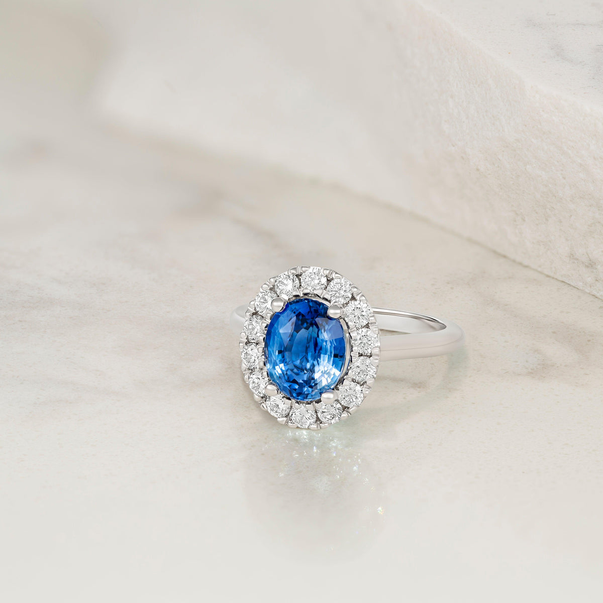 Blue Sapphire Diamond Halo Engagement Ring