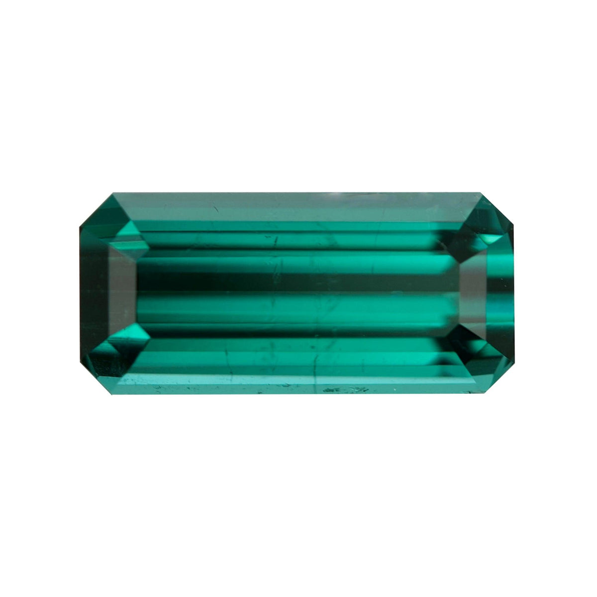 High-clarity elongated sea-green tourmaline with truncated corners.