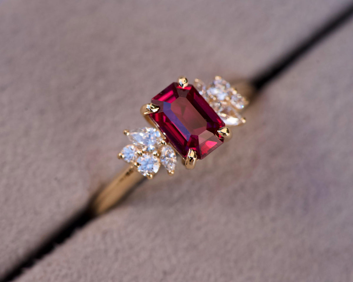 Macro close-up of a 1.17 carat unheated red ruby step cut ring with side diamonds