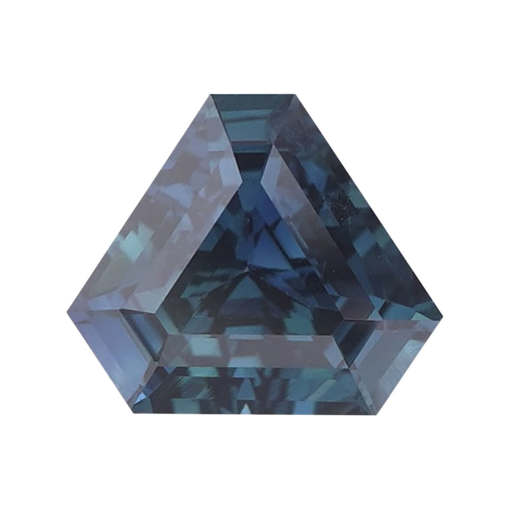 Custom geometric fancy-cut loose sapphire in greenish-blue tones.