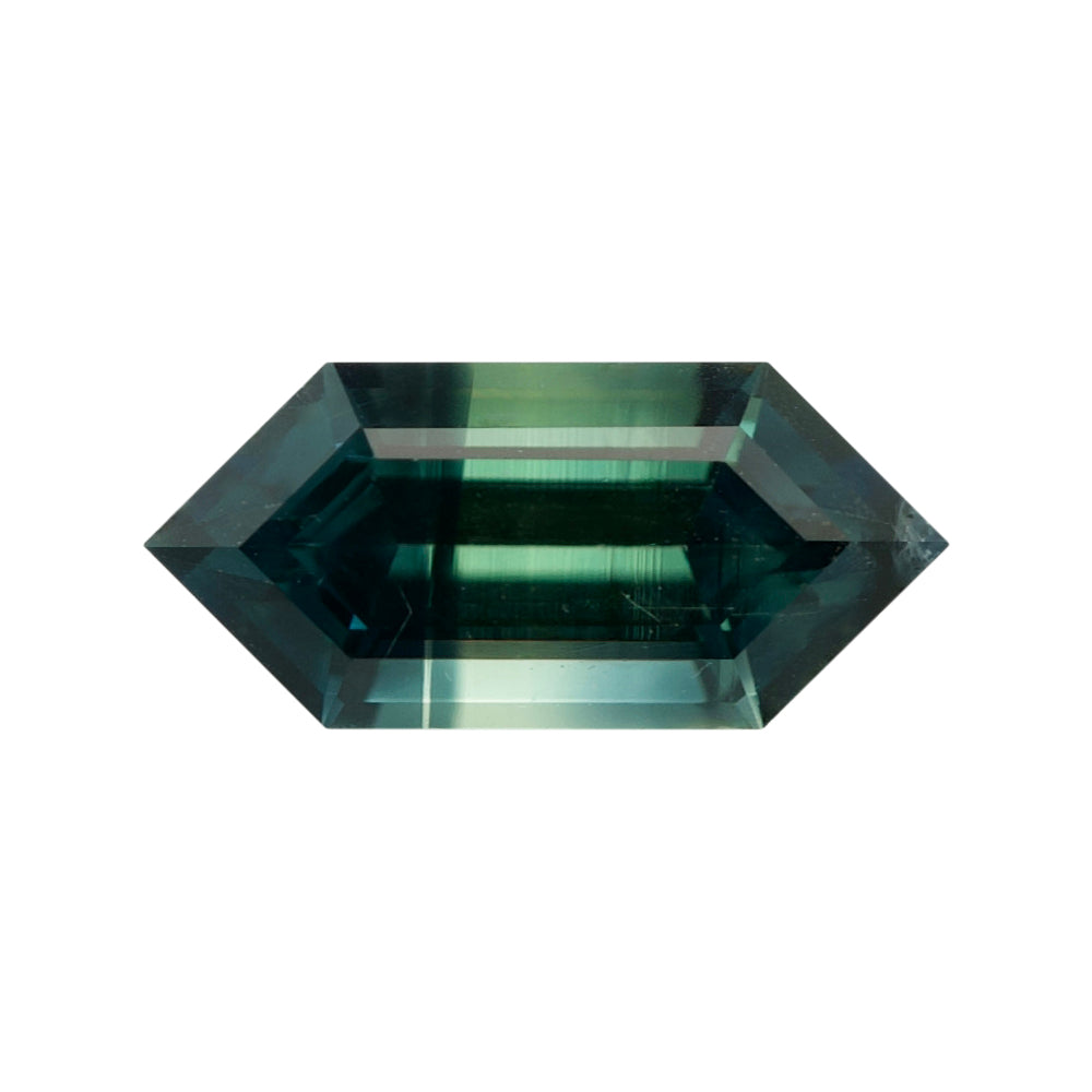 Dark blue-green elongated hexagonal step-cut loose crystal.