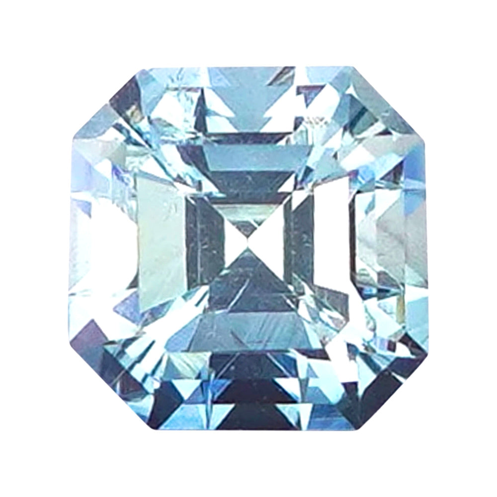 Square step-cut loose sapphire in a brilliant light ice-blue tone.