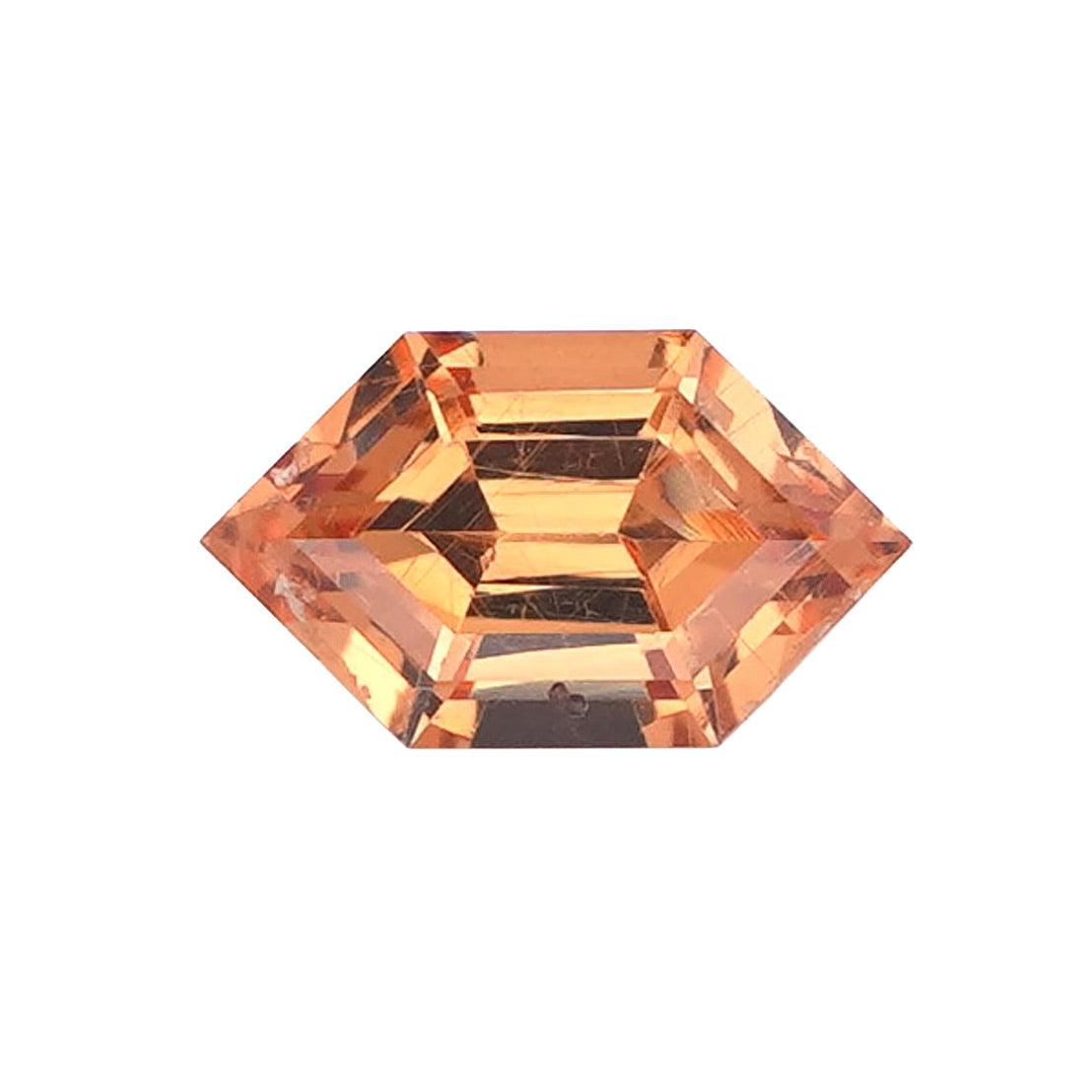 Loose orange Spessartine Garnet with a fancy step cut.