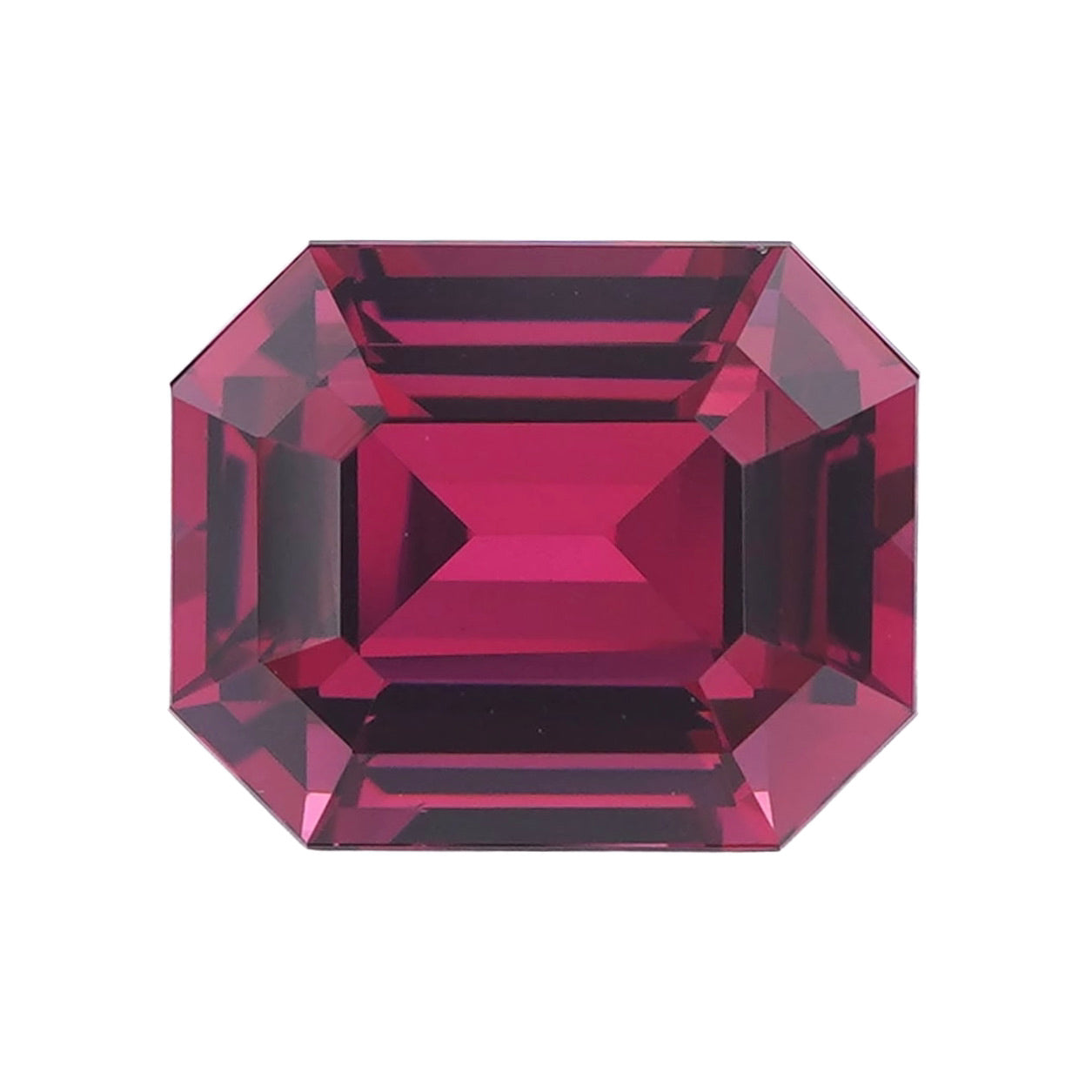 Loose purplish pink rectangular step-cut rhodolite garnet.