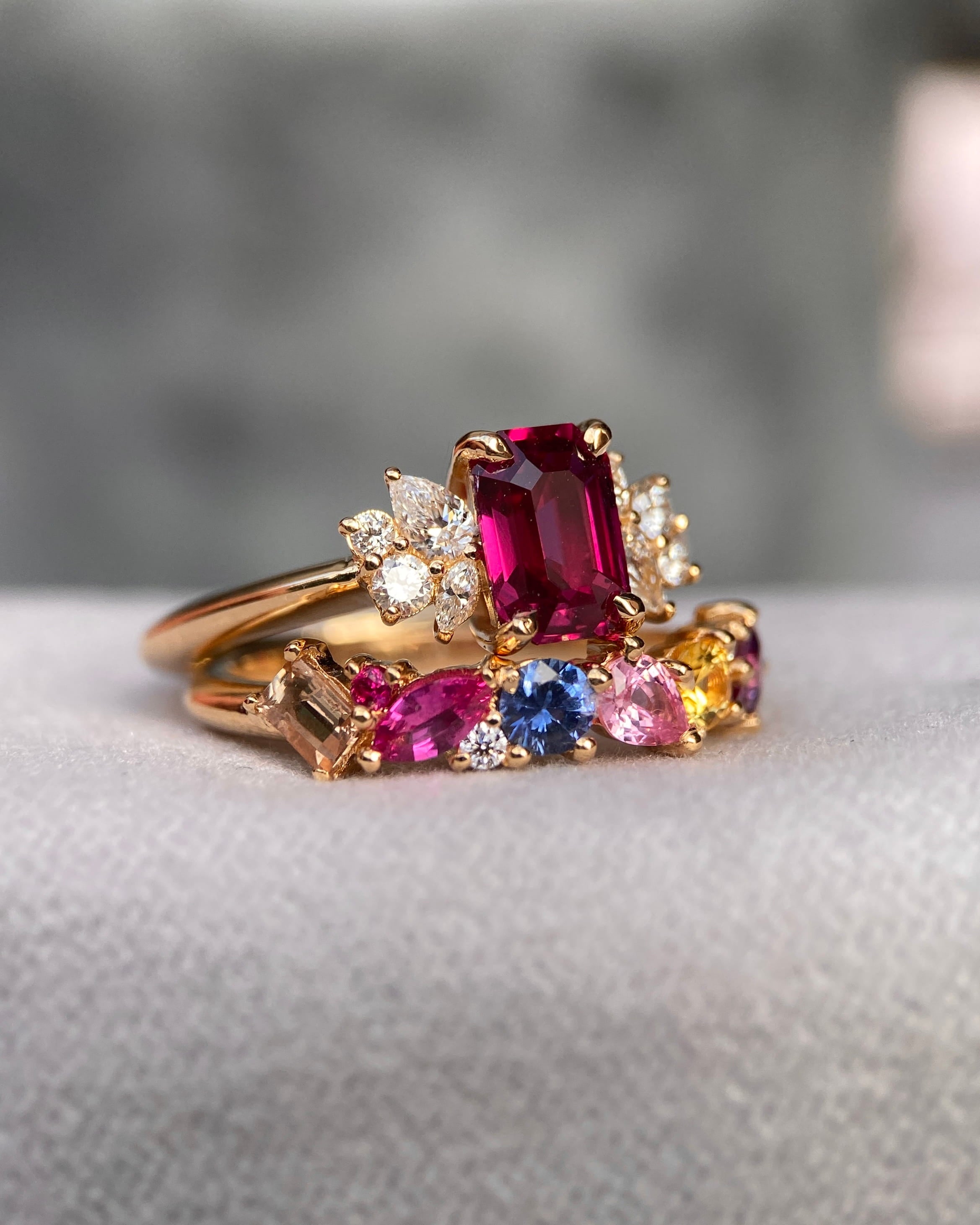 Bespoke unheated Mozambique ruby ring stacked elegantly with a multi-colour natural sapphire eternity band