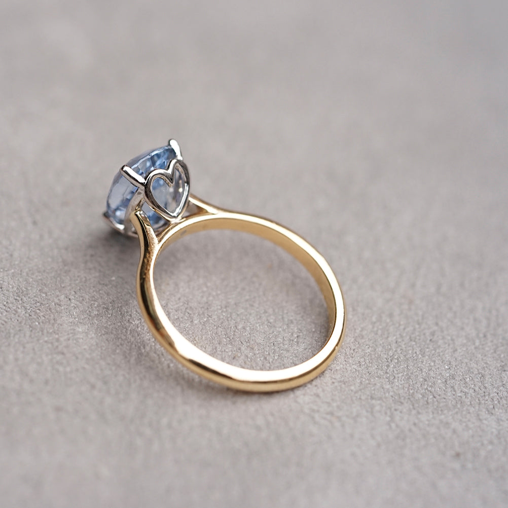 sparkling custom blue ceylon pear sapphire ring in white and yellow gold