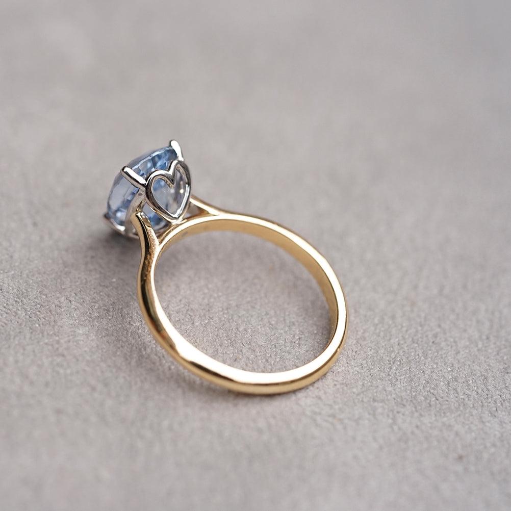 sparkling custom blue ceylon pear sapphire ring in white and yellow gold