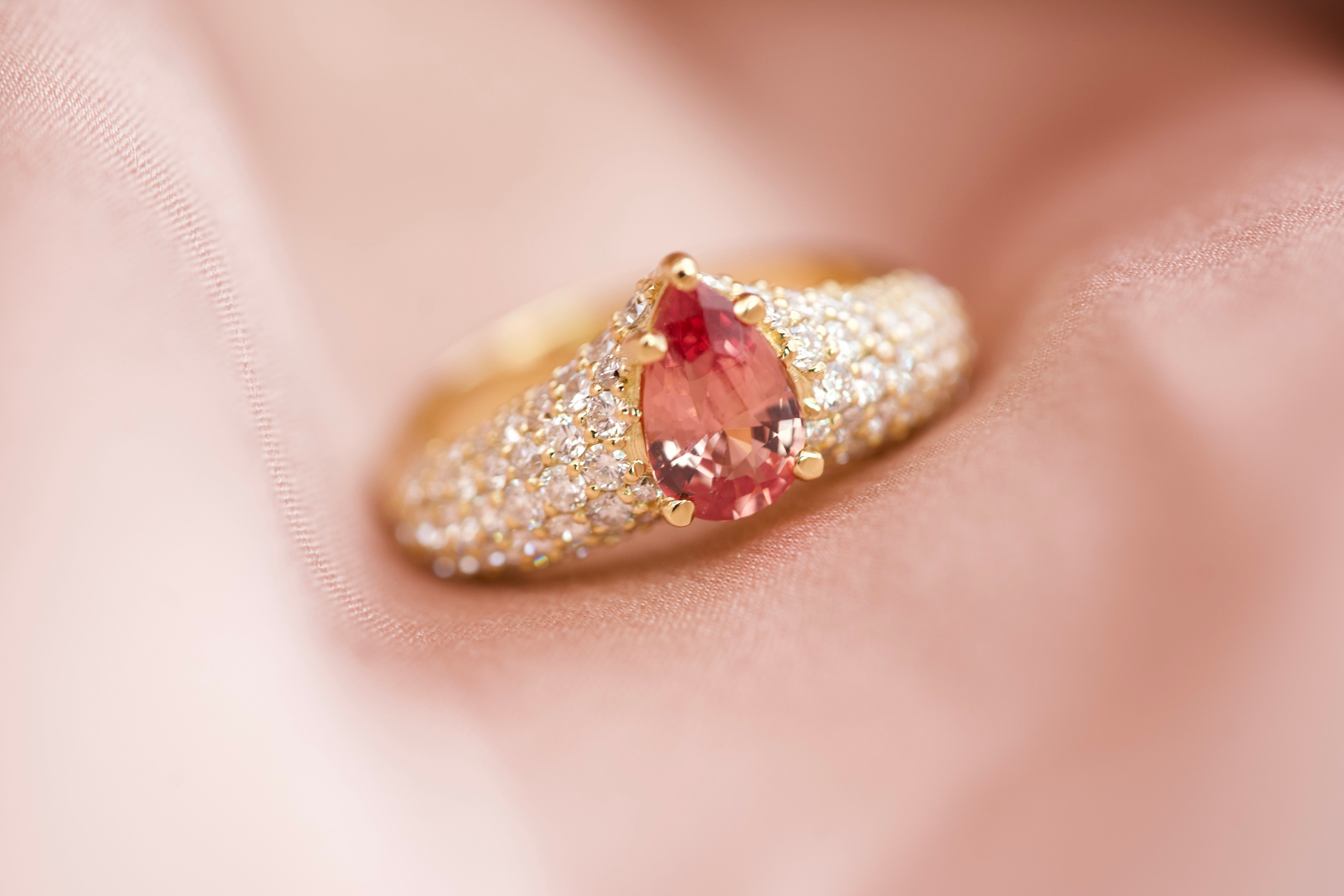 Padparadscha sapphire diamond ring on silk, detail