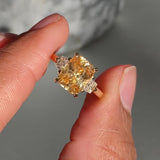 Apricot Sapphire Trapezoid Diamond Trilogy Engagement Ring