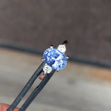 Vivid Medium Blue Oval Sapphire Diamond Platinum Trilogy Engagement Ring