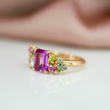 ring design with a cluster of sapphires side view