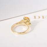 Apricot Sapphire Trapezoid Diamond Trilogy Engagement Ring