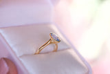 Sky blue oval Ceylon sapphire in yellow gold bezel setting
