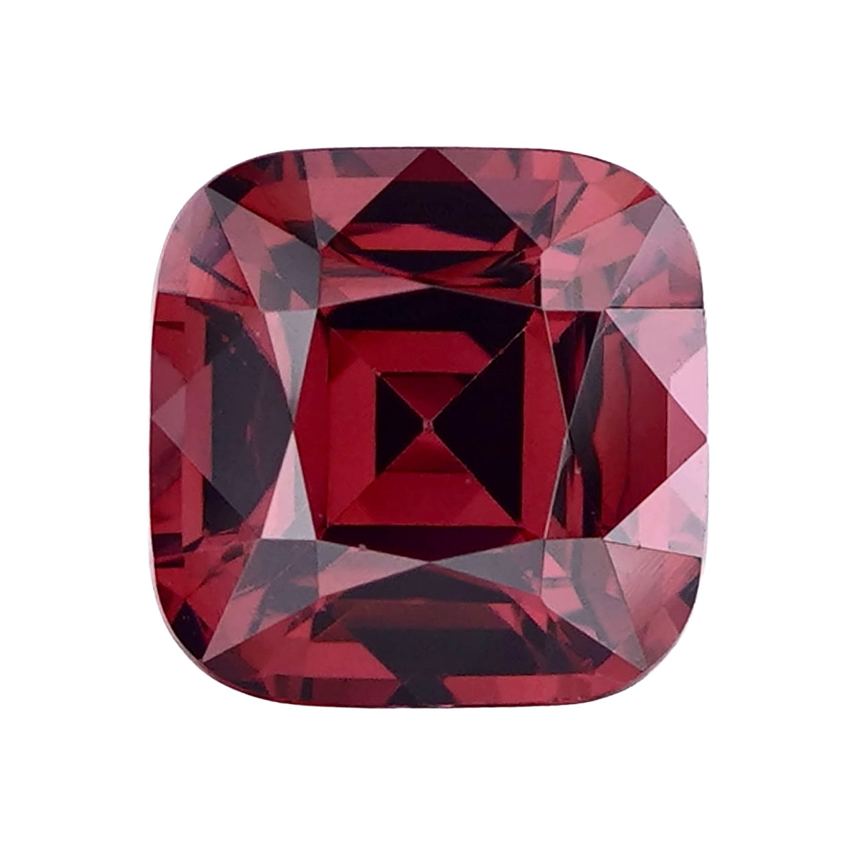 Top-down close-up of a square cushion mixed-cut purplish pink rhodolite.