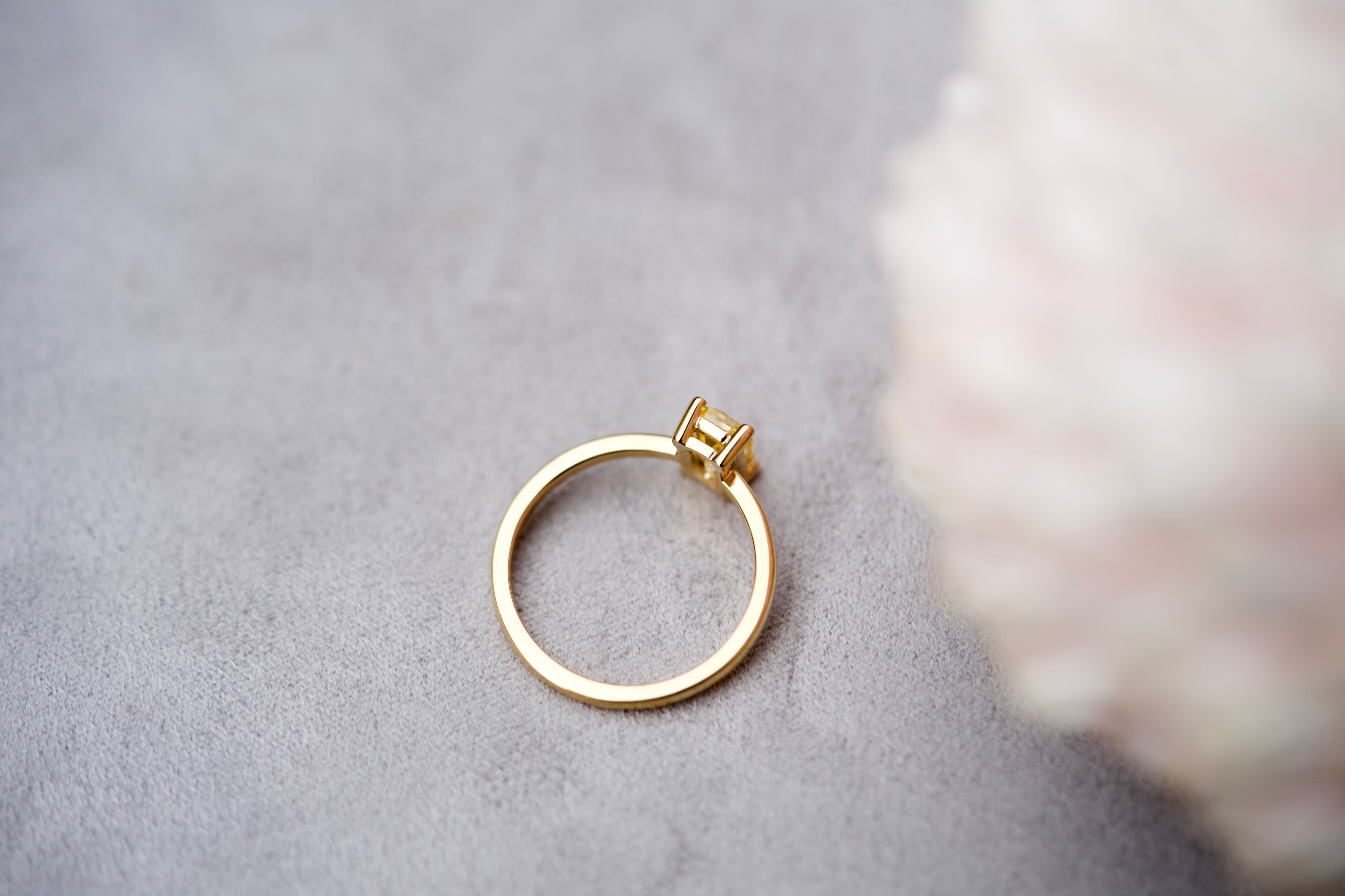 Yellow sapphire emerald cut ring, aerial view