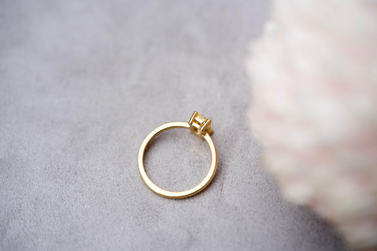 Yellow sapphire emerald cut ring, aerial view