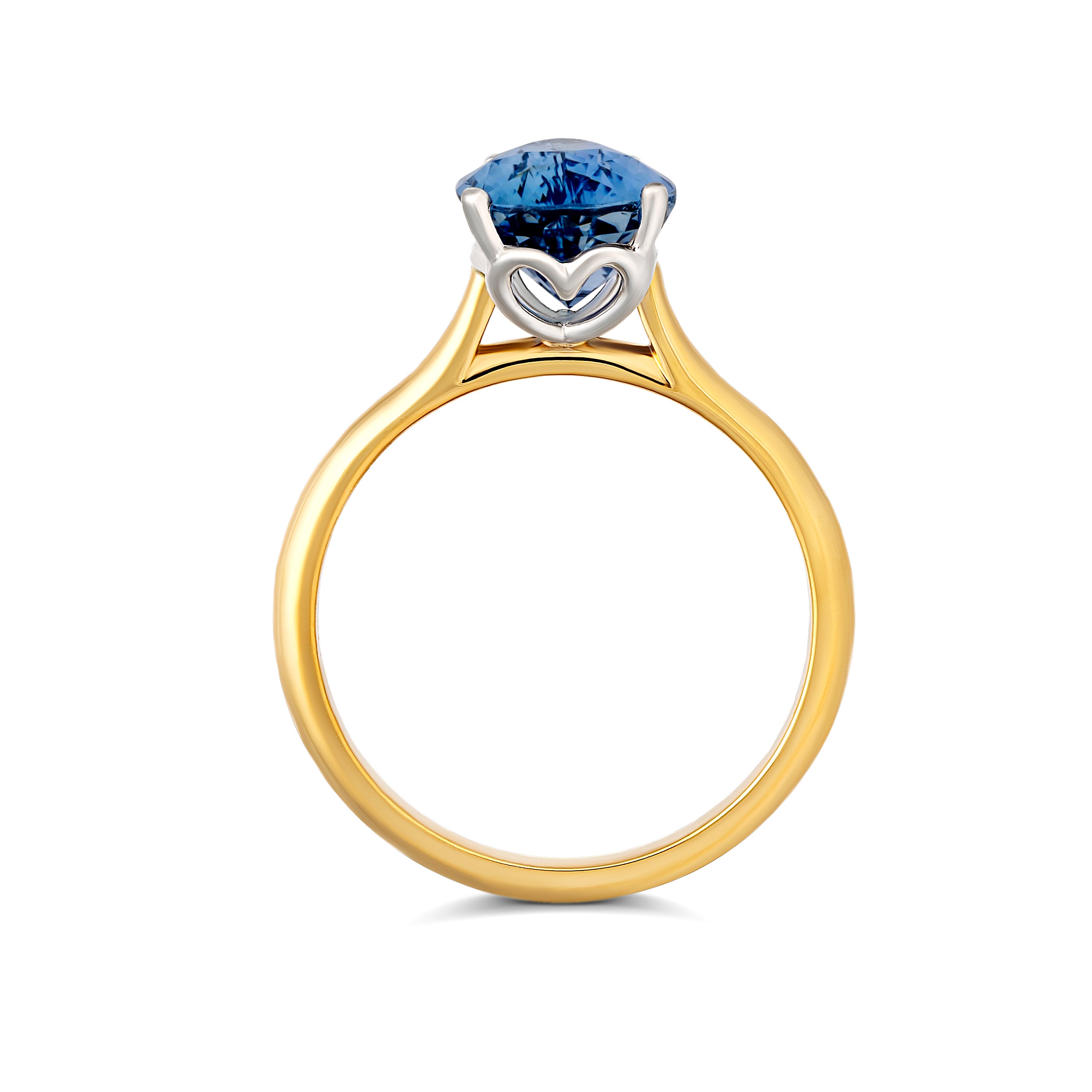 custom made blue ceylon pear sapphire ring in white and yellow gold
