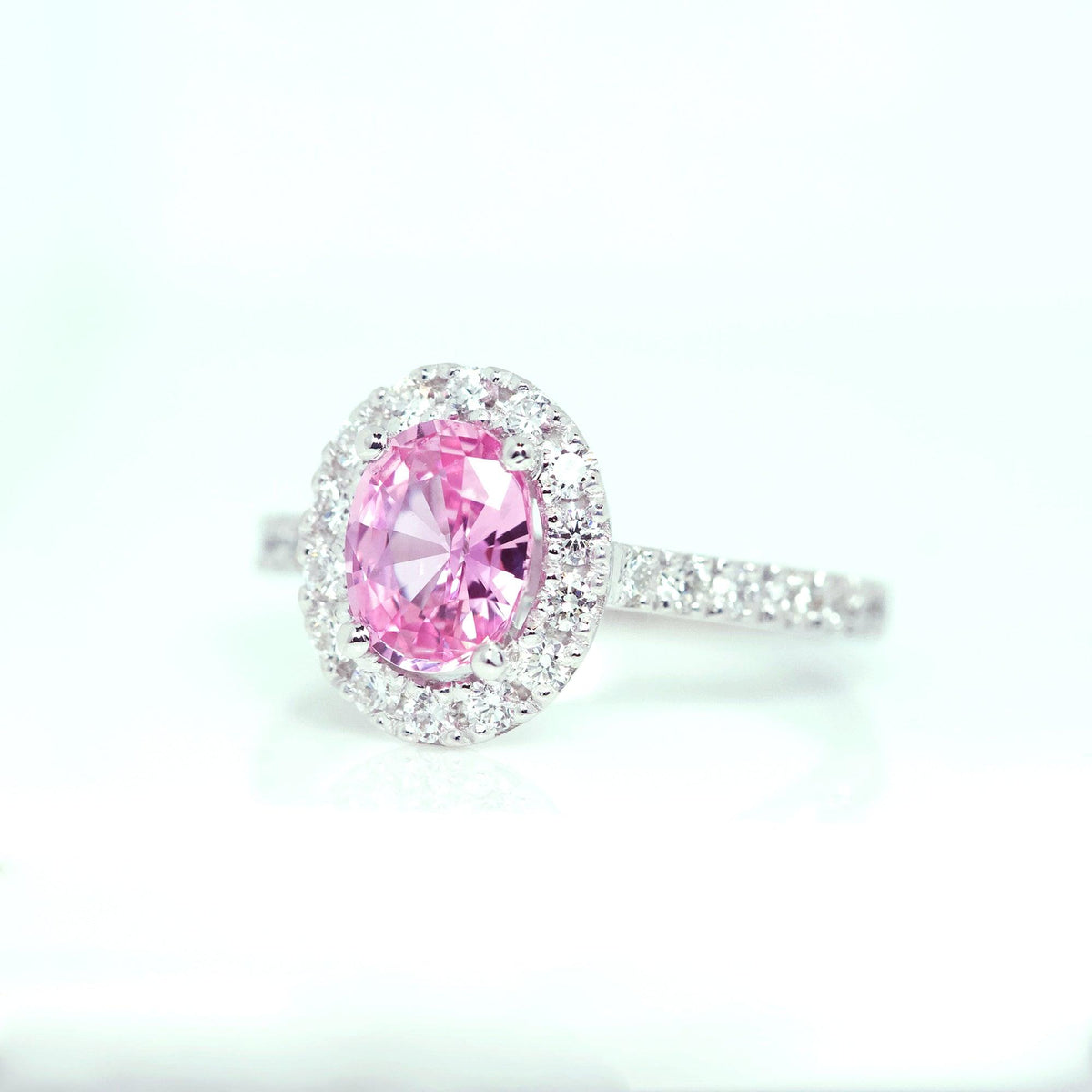 Oval Pink Sapphire Diamond Halo White Gold Ring