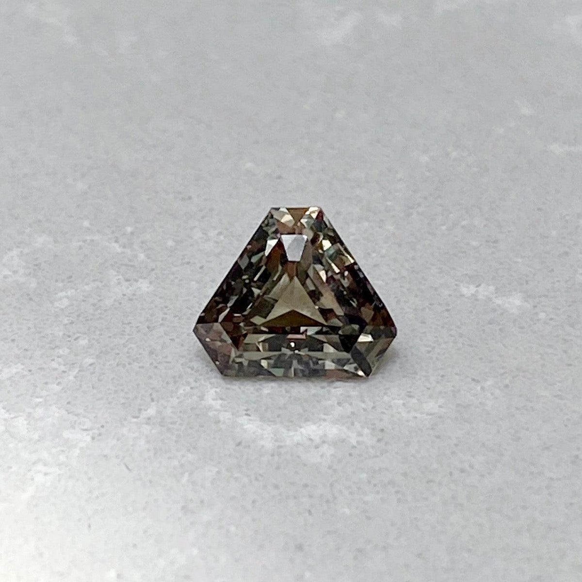 1.55 ct Green Colour Change Sapphire Triangular Cut Unheated Ceylon