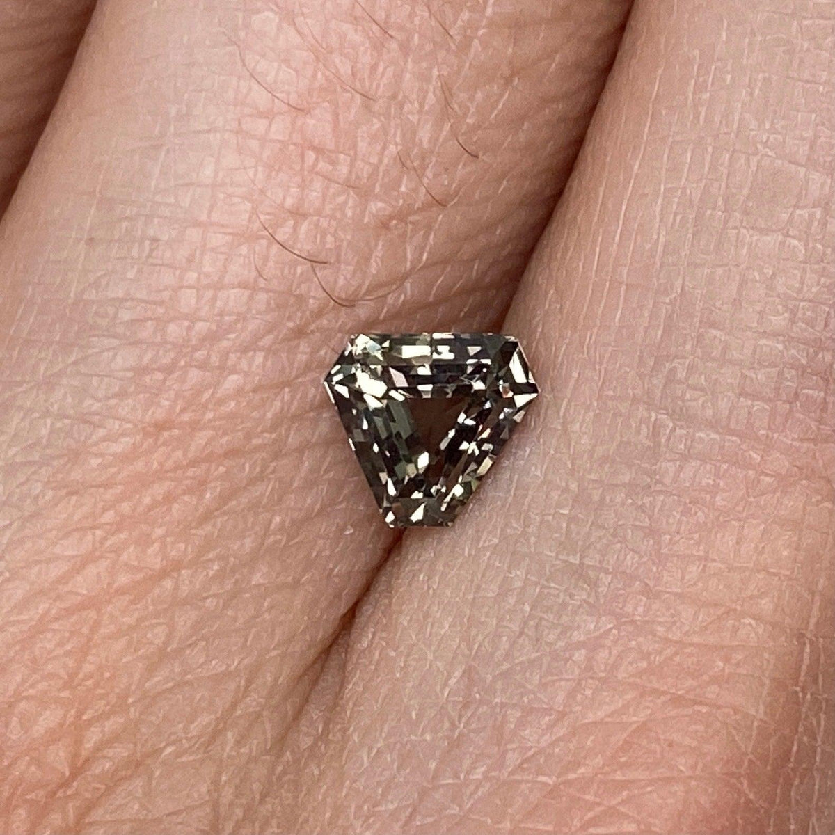 1.55 ct Green Colour Change Sapphire Triangular Cut Unheated Ceylon