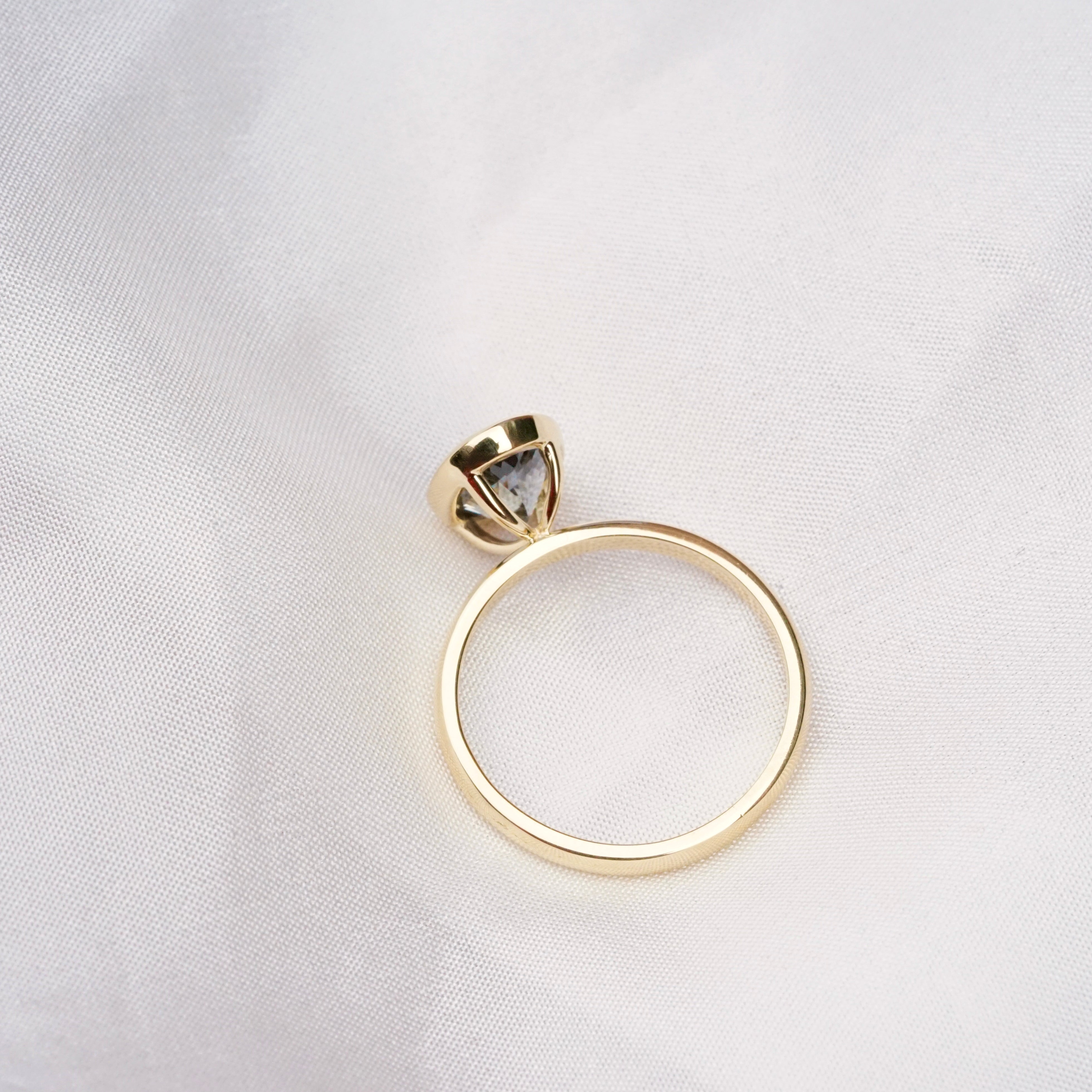 Grey Sapphire Oval Bezel Set Elevated Ring